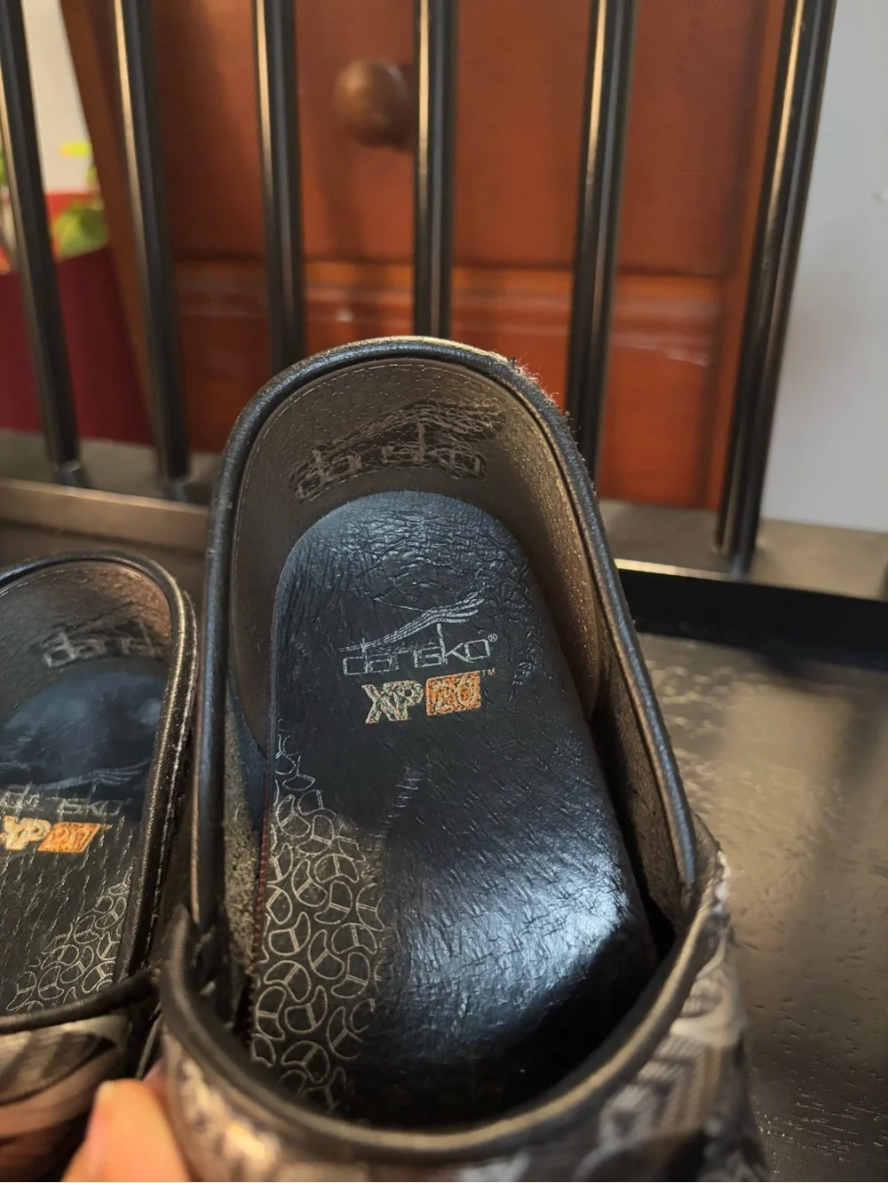 Dansko Black Clogs with Silver Floral Print